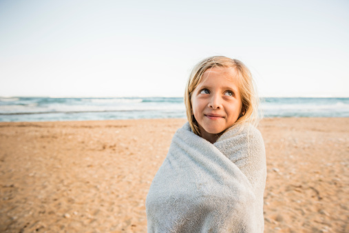 Girl wrapped in a blanket