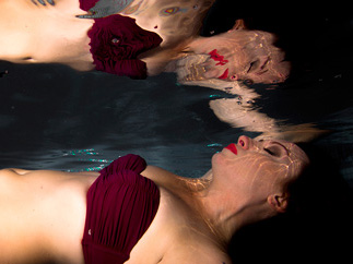 A woman relaxing under water